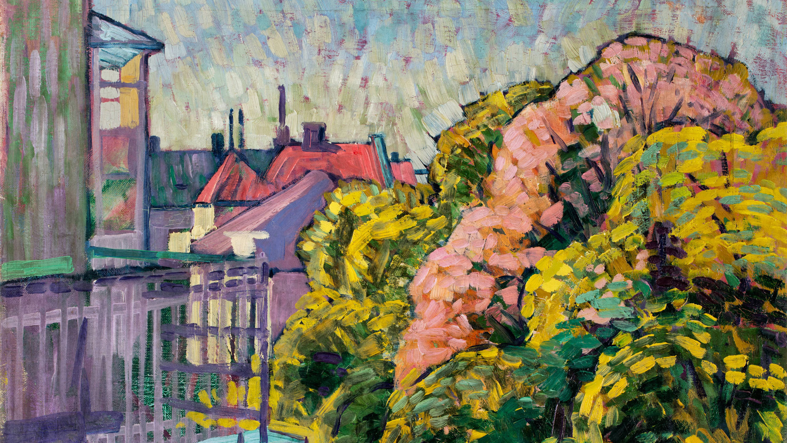 Buntes impressionistisches Gemälde einer Stadtlandschaft mit roten Dächern im Hintergrund und üppigen grünen und rosa Bäumen im Vordergrund unter einem strukturierten, pastellfarbenen Himmel.